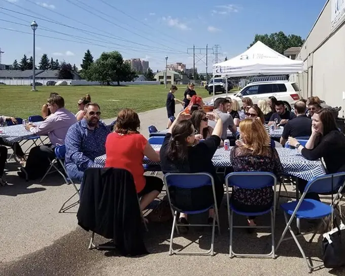 The team at a community barbecue