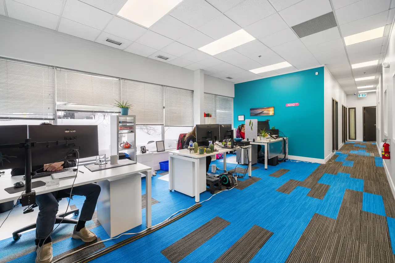 The All Insurance team at work in the open office